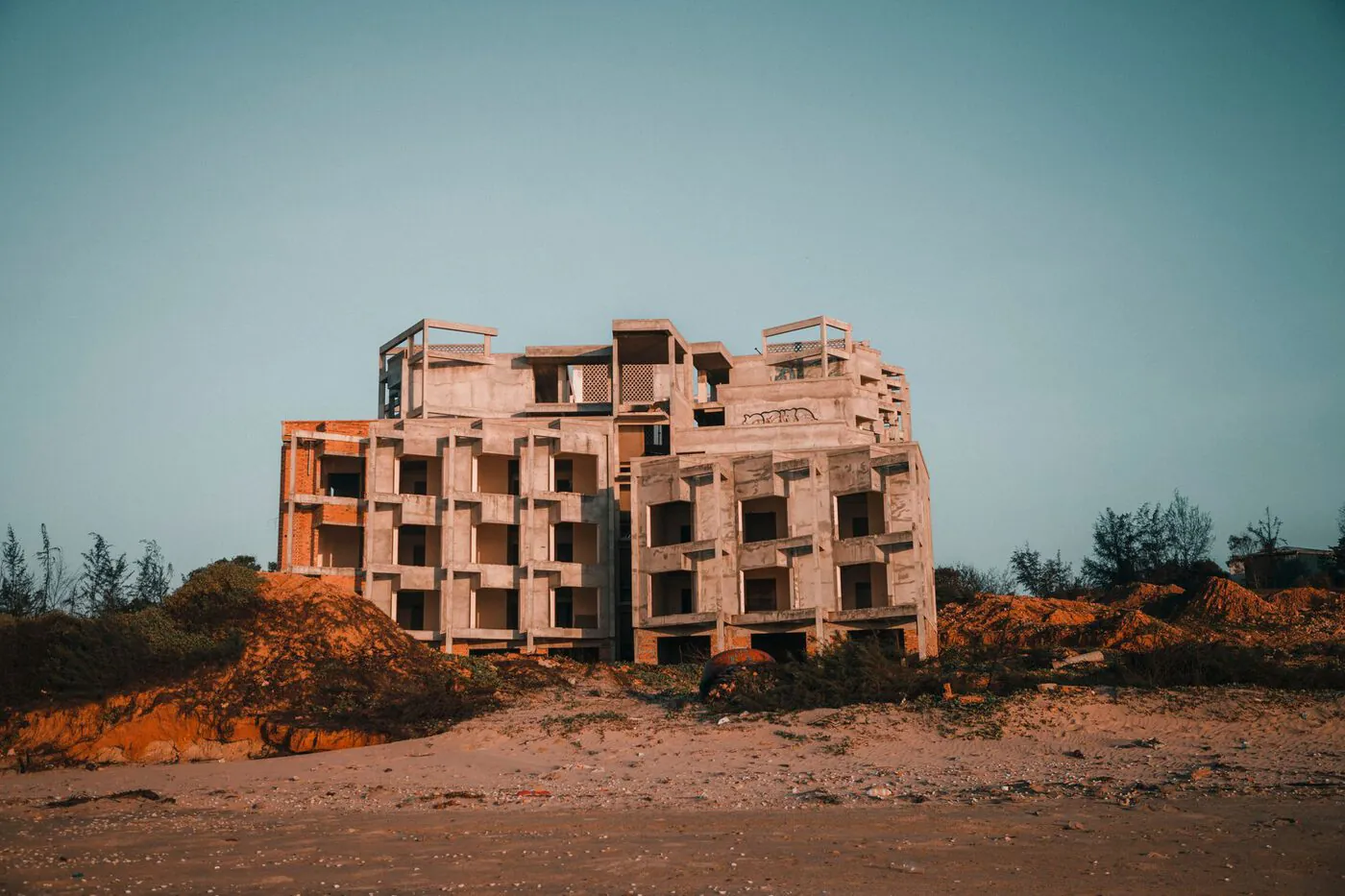 An unfinished concrete building shell on the Vietnamese coast.